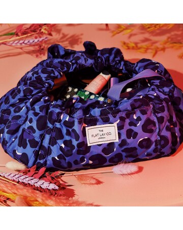 The Flat Lay Co. Drawstring Makeup Bag in Blue Leopard